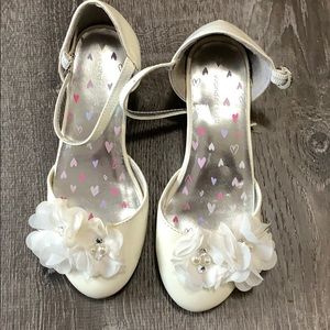 White dress shoes with flowers and beads